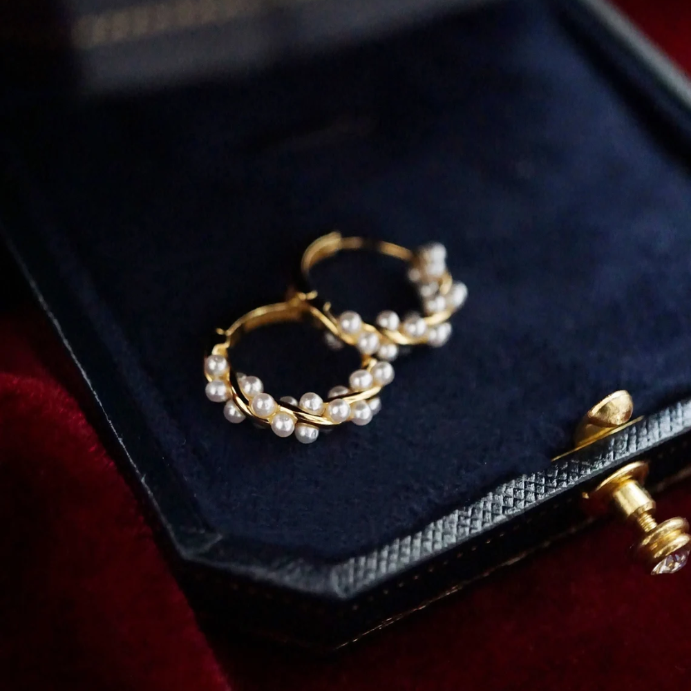 Women Twisted Earrings with Ball Detail - 1 Pair