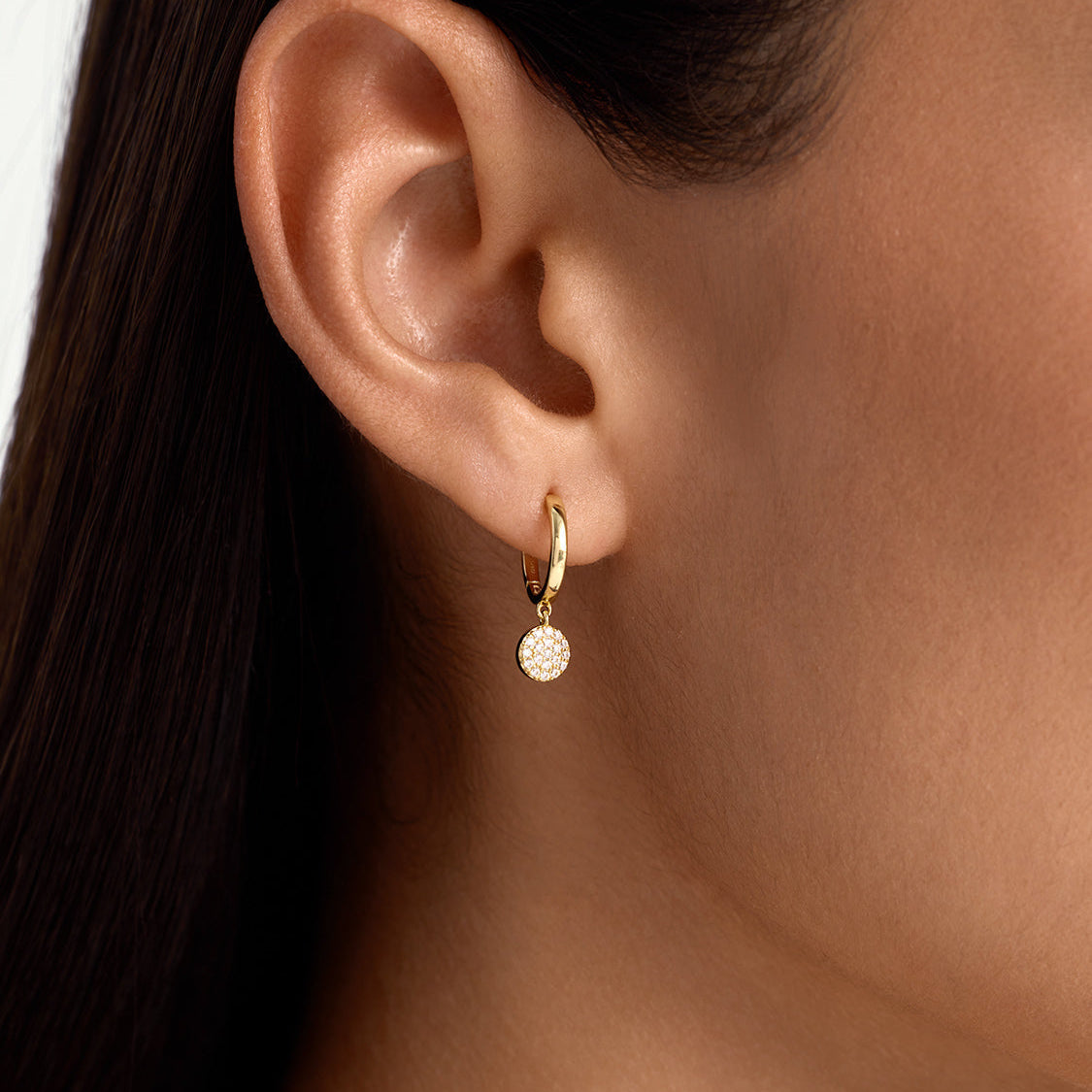 Women's Huggie Earrings with Circular Pendant and Gemstone Accents