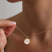 Women's Medallion Pendant Chain featuring Cross Accent and Textured Surface