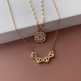 Four-leaf clover necklace with heart