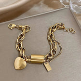 Women's Statement Chain Bracelet Featuring Heart Charms and Multi-Layered Chain Details