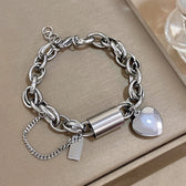 Women's Statement Chain Bracelet Featuring Heart Charms and Multi-Layered Chain Details