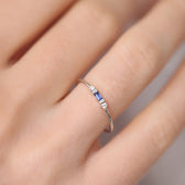 Women's Ring with Baguette Detail and Side Stone Accents