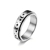 Ladies spinning ring with moon and star and movable design