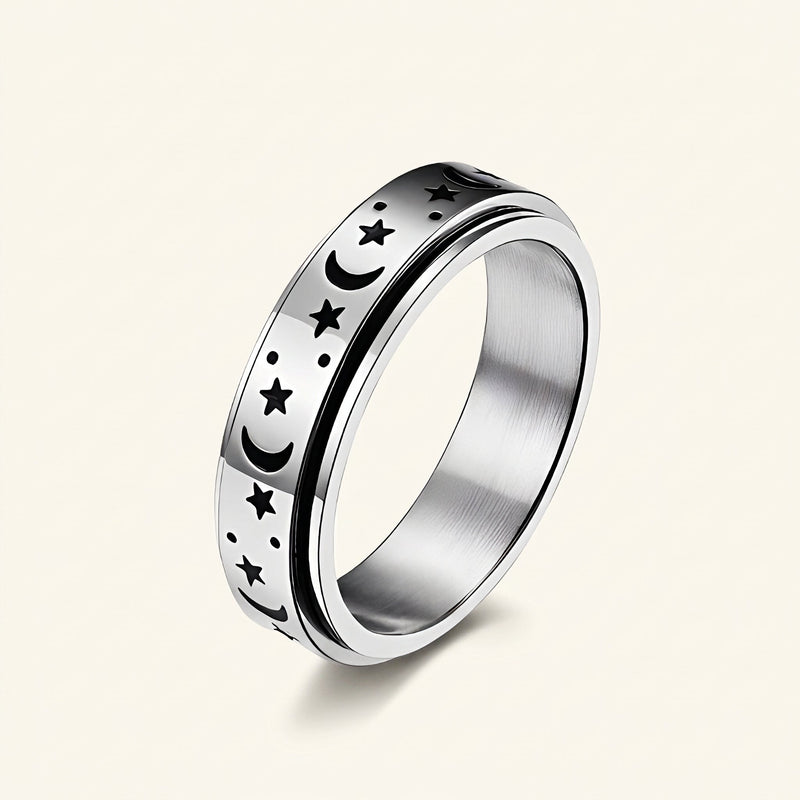 Ladies spinning ring with moon and star and movable design
