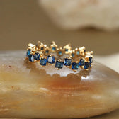 Women's Ring with Scattered Square Stone Accents and Offset Design